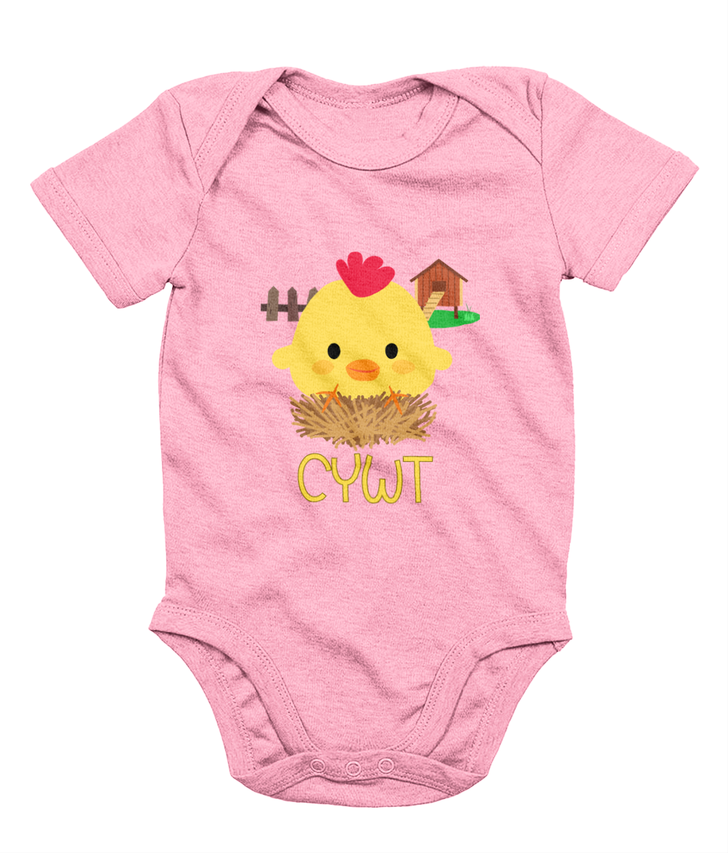 A pink babygrow with a illustration of a baby chick and the text 'CYWT' on the front.