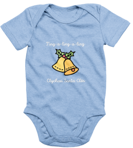 A blue babygrow with the text 'Clychau Santa Clôs' printed on it, featuring a graphic of Santa's bells.