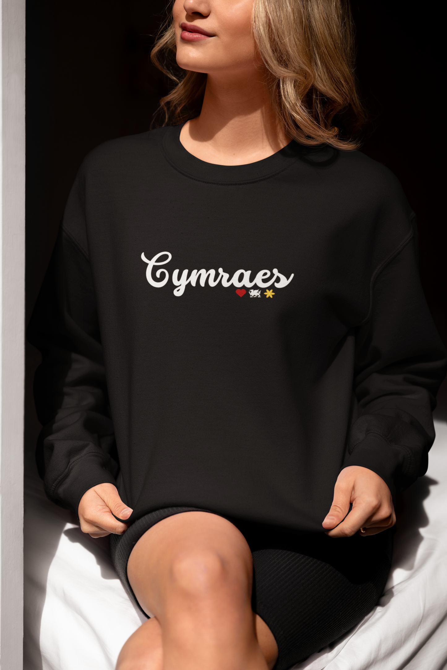 Front view of Cymraes Embroidered Sweatshirt displaying 'Cymraes' embroidery.
