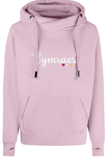Pink hoodie with 'Cymraes' text and heart designs on a white background