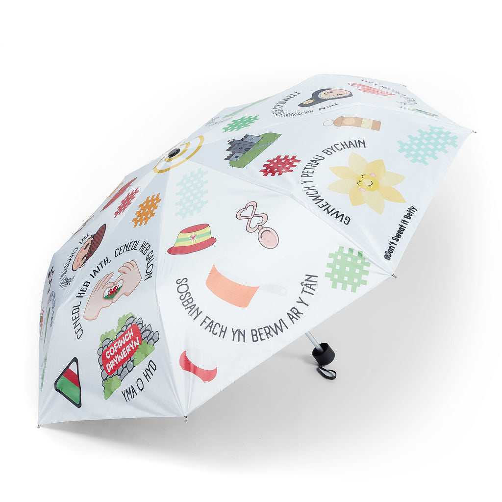 Umbrella with colorful illustrations on a white background