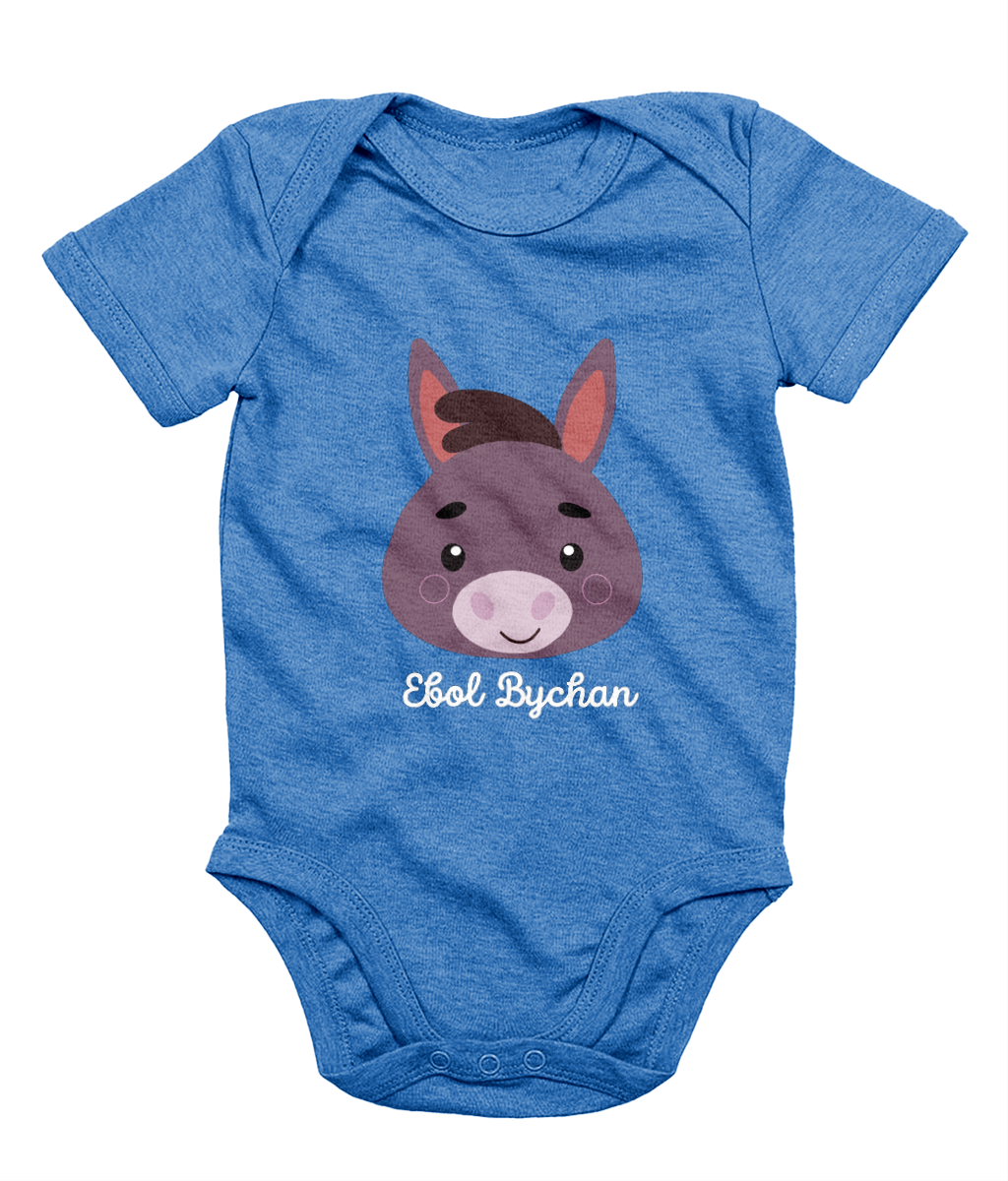Blue babygrow with a graphic of a donkey's face and the text 'Ebol Bychan' printed on the front.