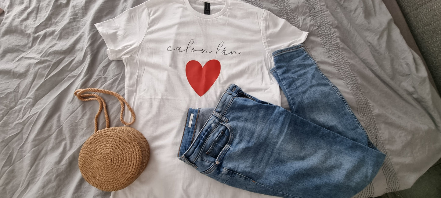 White Calon Lan Womens T-Shirt styled outfit with jeans and a woven handbag