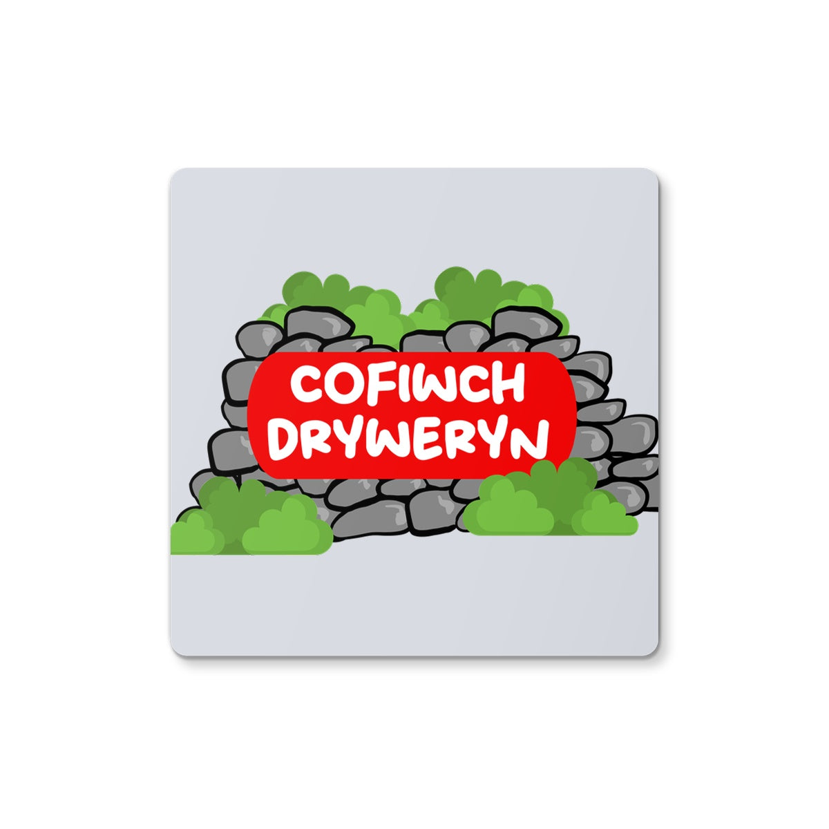 A square coaster with a green background featuring a red and white text that reads 'COFIWCH DRYWERYN' on a simulated stone wall design.