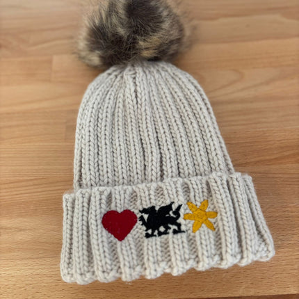 Bobble hat with welsh symobols