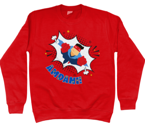 Children's sweatshirt in red with a colorful front graphic print featuring a superhero character and the Welsh word 'amdani'.