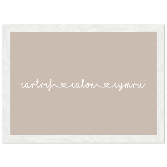A framed wall art print with Welsh typography, featuring the words 'cartref', 'calon', and 'cymru' in a white frame.