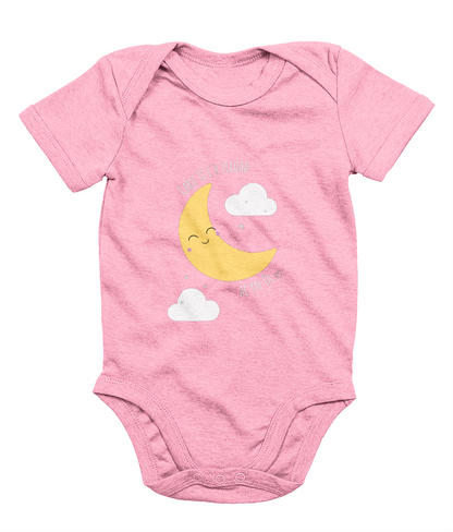 A pink babygrow with a graphic print of a crescent moon and clouds, and the phrase 'Caru Ti i’r Lleuad' printed on the front.