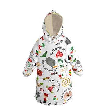 A white hoodie blanket with a welsh themed design.