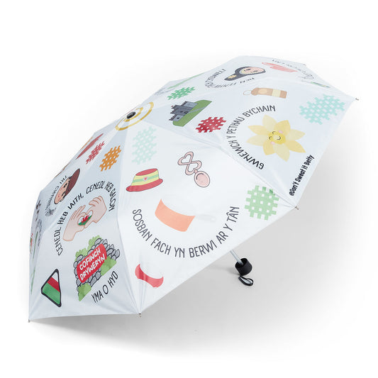 Umbrella with colorful illustrations on a white background