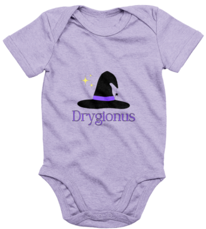 Purple baby onesie with a witch hat design and 'Dryglonus' text on a white background