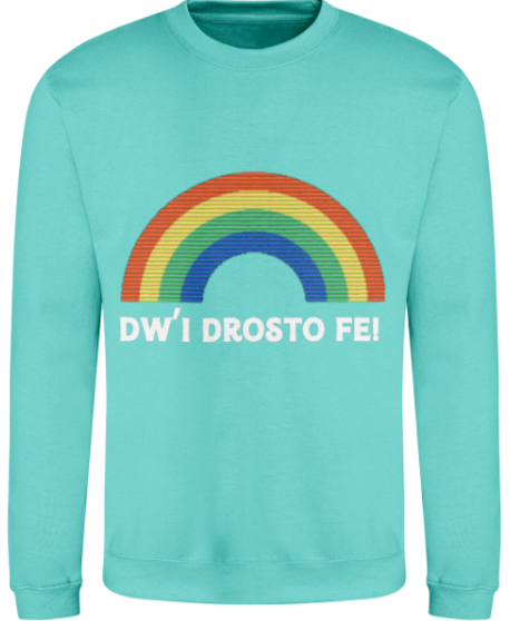 Turquoise sweatshirt with a rainbow and text on a white background