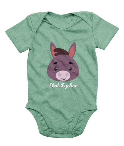 Green babygrow with a graphic of a donkey's face and the text 'Ebol Bychan' printed on the front.