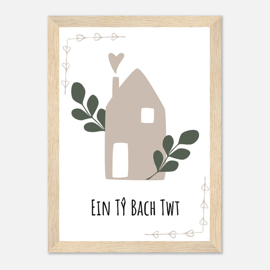 A stylized graphic of a house with decorative elements and the text 'EIN TY BACH TWT'.