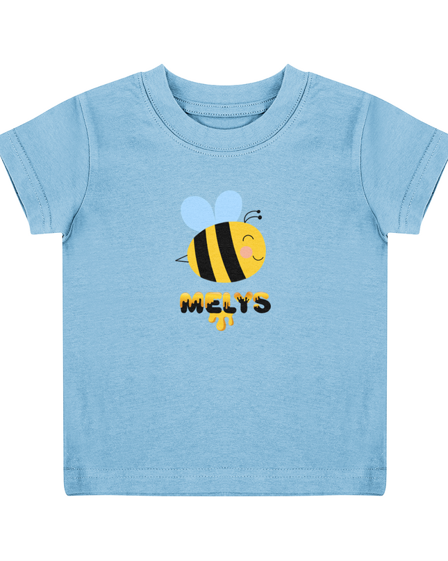 A pale blue child's T-shirt with a graphic of a bee and the name 'Melys' printed below it