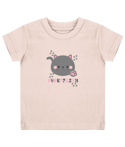 A pale pink child's T-shirt with a graphic of a cat and the text 'Purrffaith', accompanied by paw print designs.