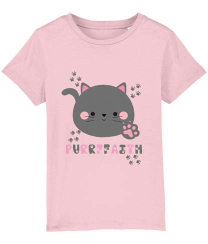 A light-colored girls' t-shirt with a graphic of a cartoon cat and the text 'Purrffaith'. The shirt is designed for children and is organic cotton.