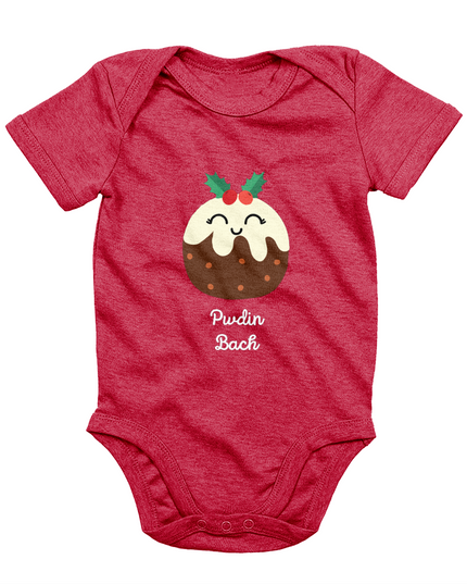 A red sleeveless babygrow with a graphic print of a Christmas pudding and the Welsh phrase 'Pwdin Bach'.