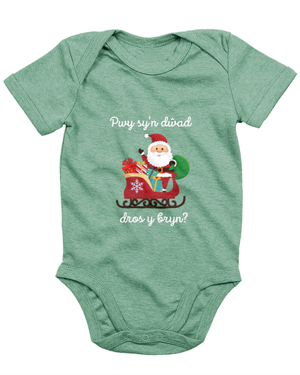 Green sleeveless babygrow with a festive Welsh phrase and Christmas-themed graphics including Santa Claus.