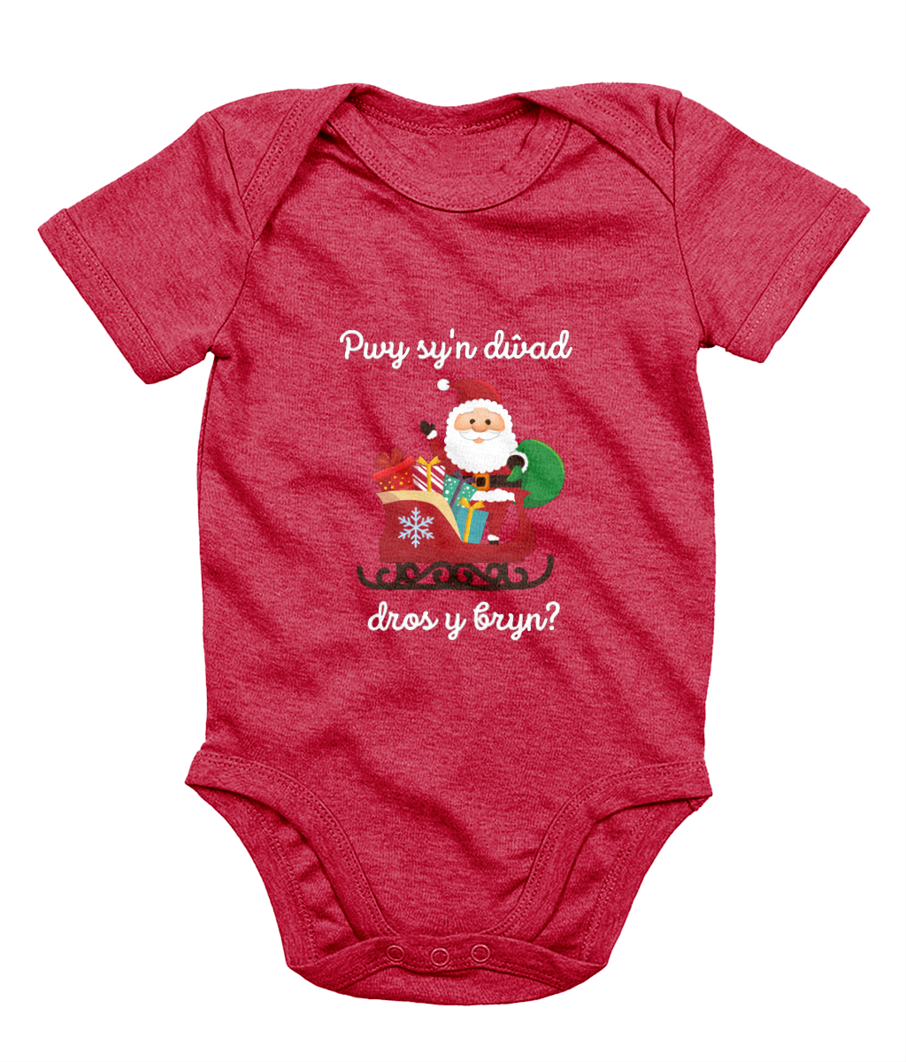 Red sleeveless babygrow with a festive Welsh phrase and Christmas-themed graphics including Santa Claus.
