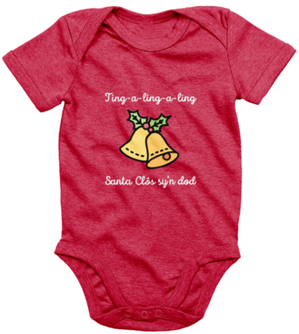 A green babygrow with 'Santa Clos sy'n dod' printed in bold lettering, featuring an image of Santa Claus's sleigh bells.