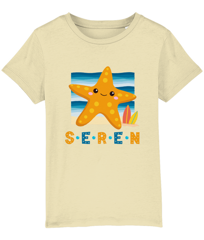 Children's t-shirt with the Welsh word 'Seren' printed on it, featuring a design with a star and colors in yellow, blue, and beige.