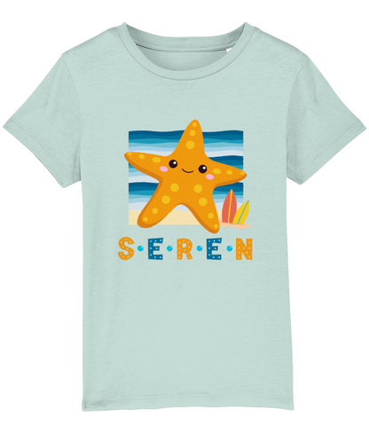Children's t-shirt with the Welsh word 'Seren' printed on it, featuring a design with a star and colors in yellow, blue, and beige.