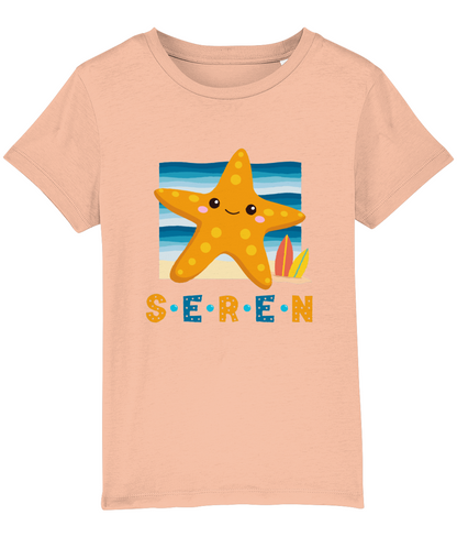 Children's t-shirt with the Welsh word 'Seren' printed on it, featuring a design with a star and colors in yellow, blue, and beige.