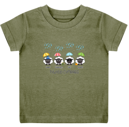 Green t-shirt with cartoon sheep and rainbows on a white background