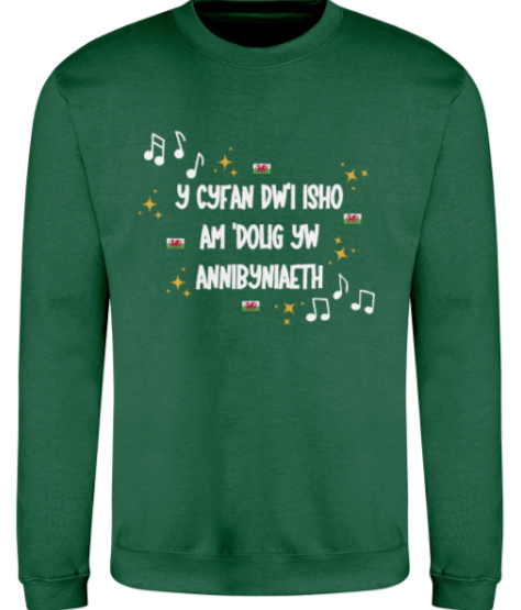 Green sweatshirt with Welsh text and music notes on a white background