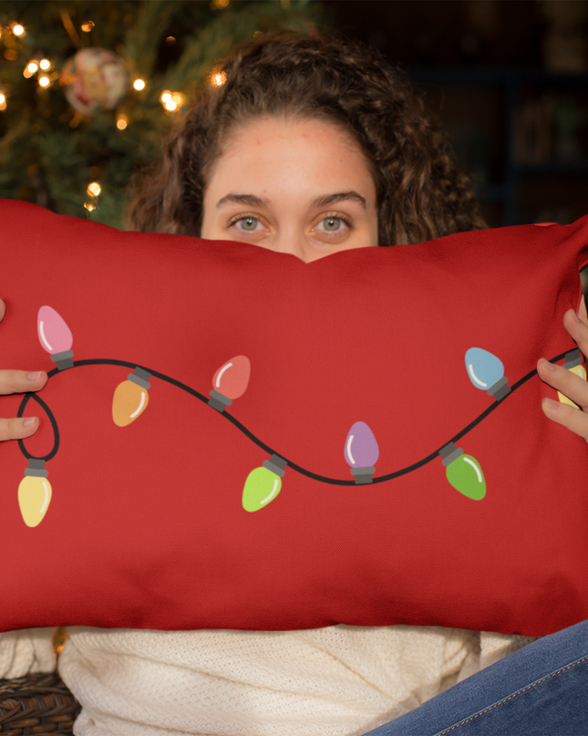 Back of the pillow with a string of Christmas lights