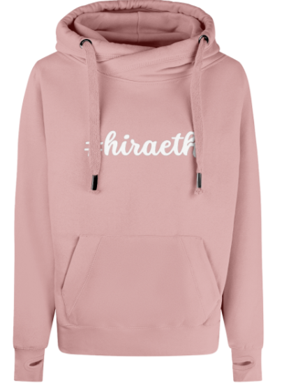 Pink hoodie with 'hiraeth' text on a white background
