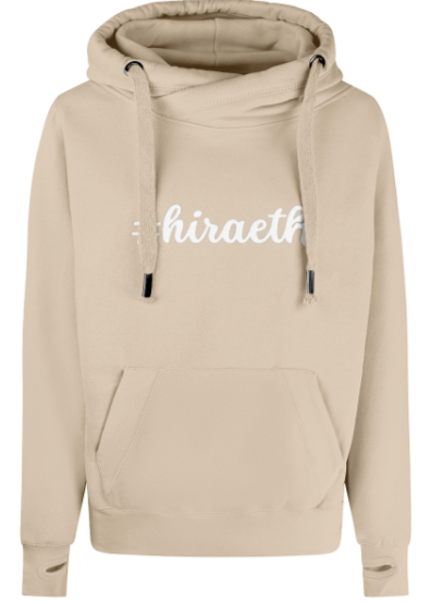Beige hoodie with 'hiraeth' text on a white background