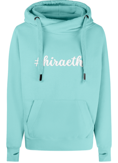 A blue hoodie with the word 'hiraeth' embroidered in white on the front.