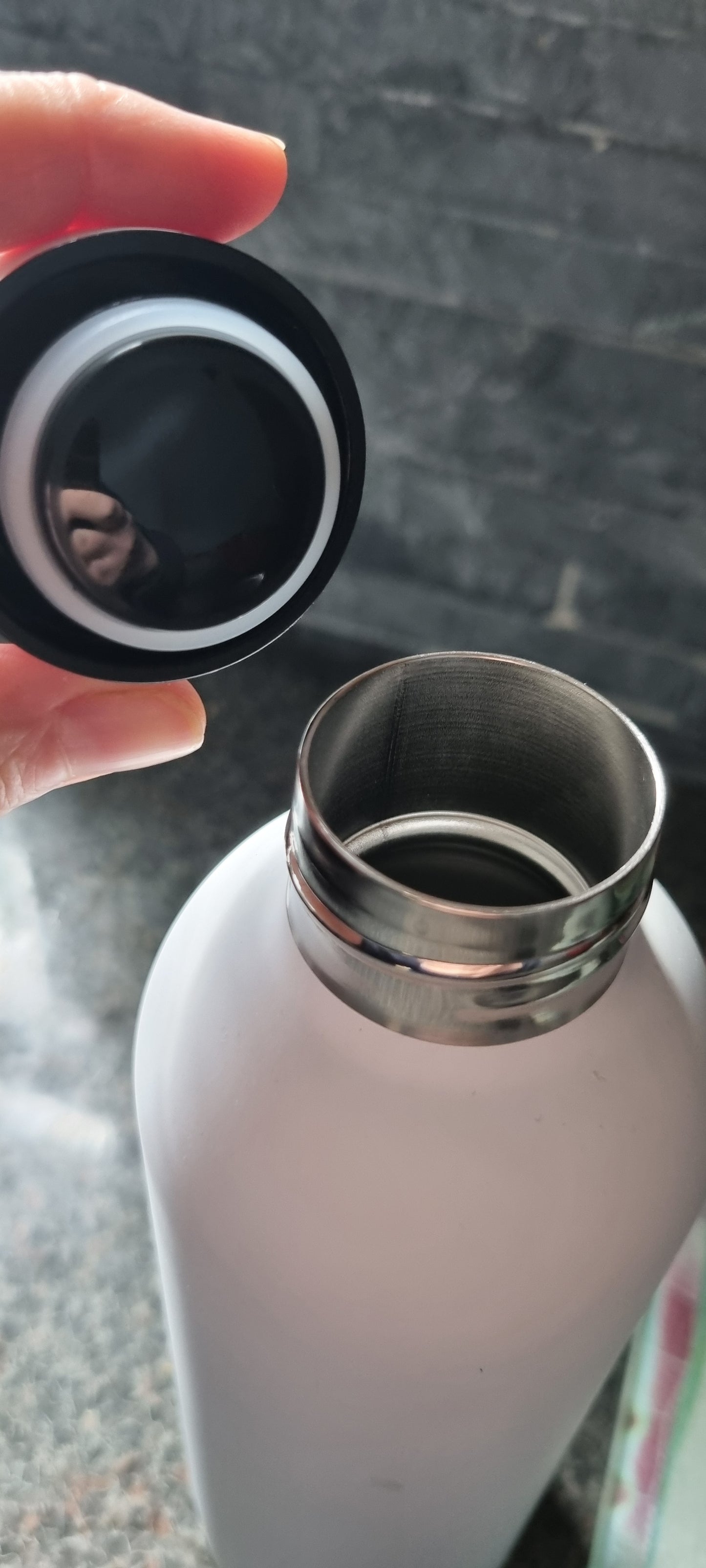 stainless steel insulated bottle with open lid